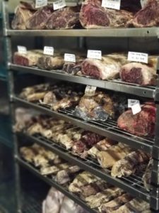 A rack of meat on display in a store.