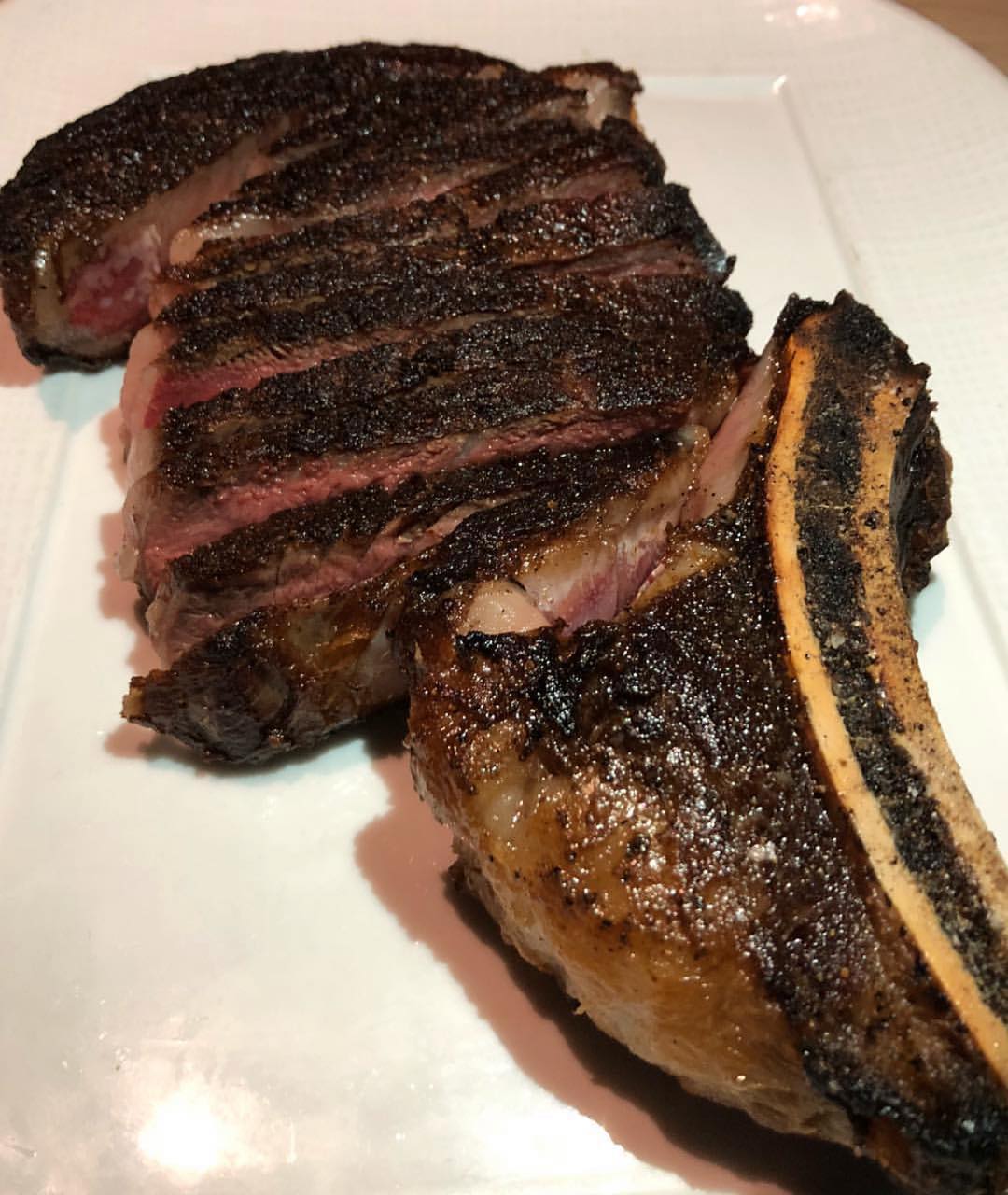 A close up of two different types of steak