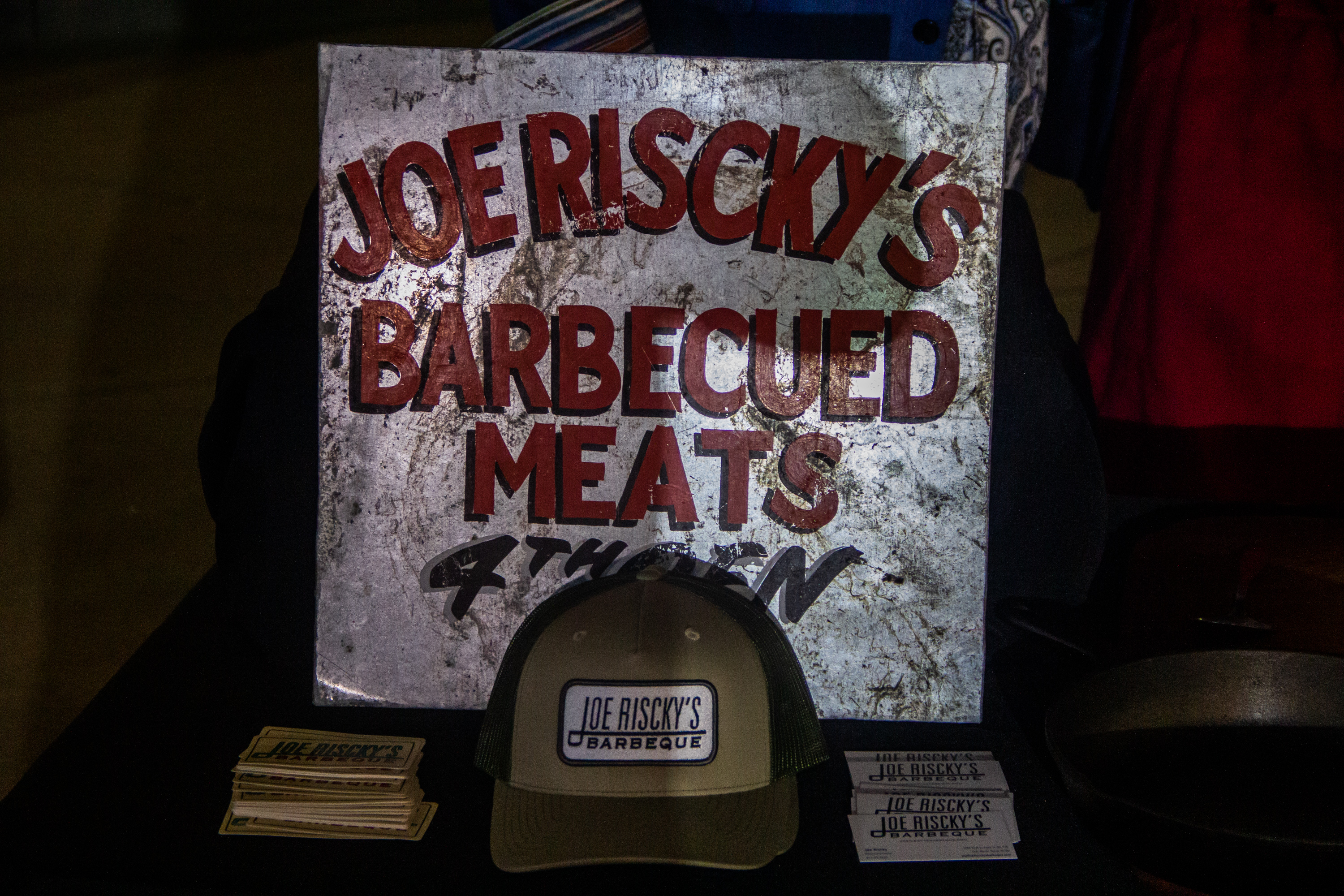 A sign for barbecued meats is displayed.