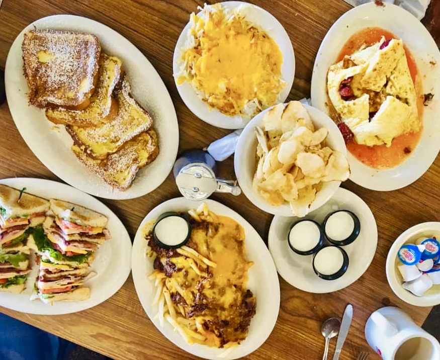 A table full of different types of food.