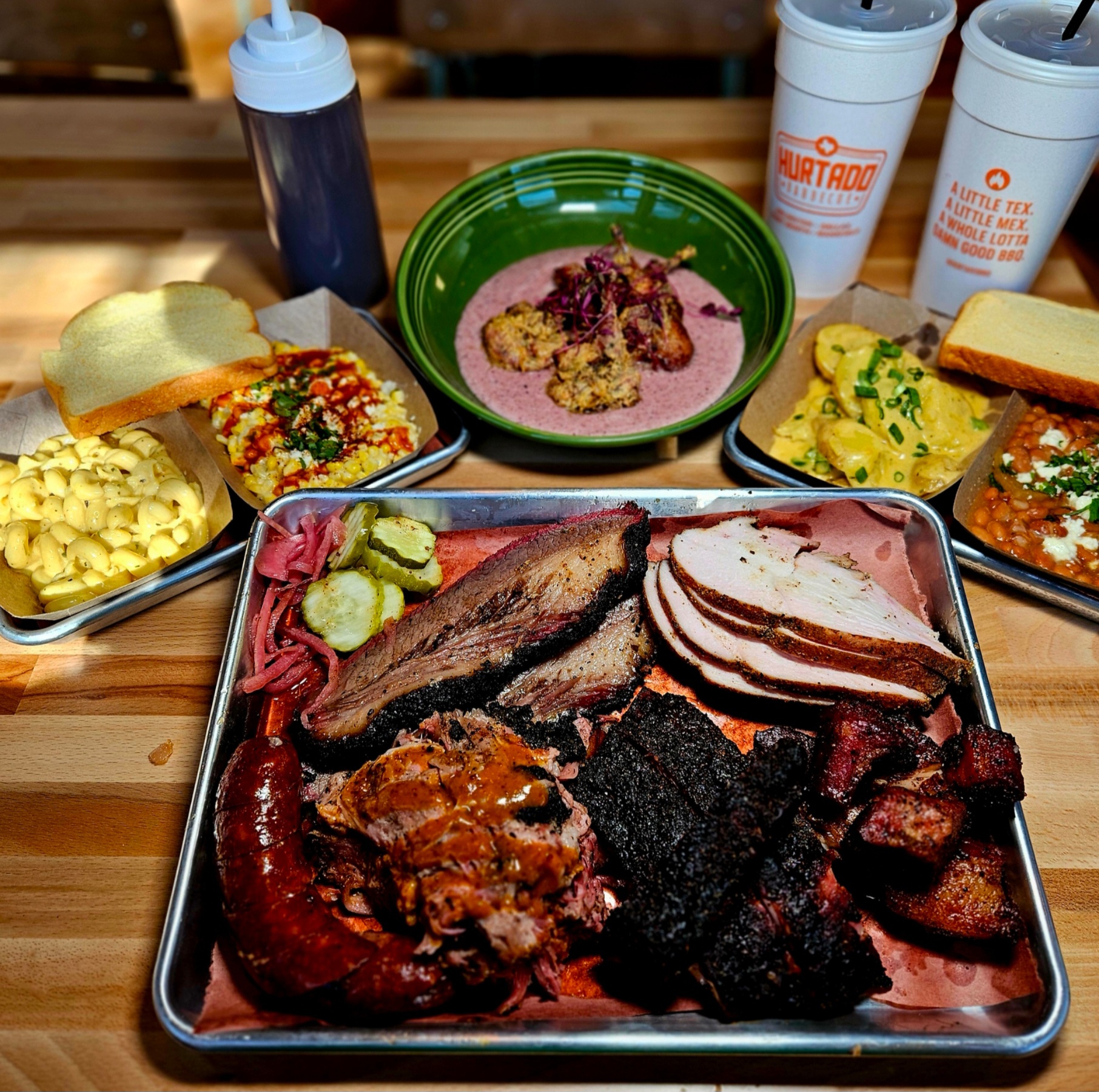 A table with several different types of food on it.